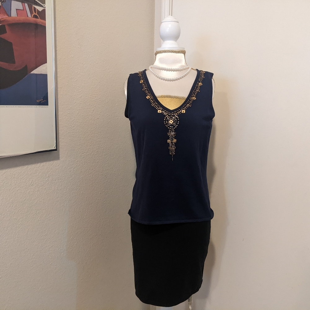 The look Randolph Duke knitted blouse with golden applique